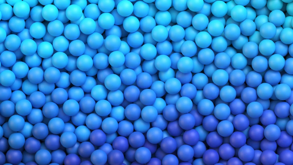 A imagem simboliza a reserva ovariana, com as bolas azuis representando a quantidade de óvulos que diminui naturalmente com o tempo.